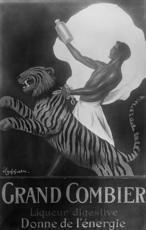 1924 - Un dompteur tient solidement un tigre bondissant avec une laisse. De l'autre main