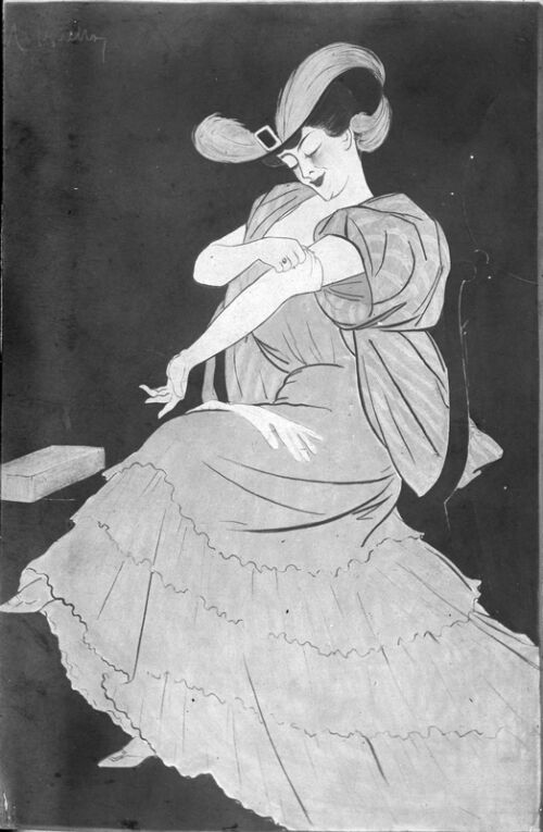 1907 - Une femme assise près d'une table essaye de longs gants.