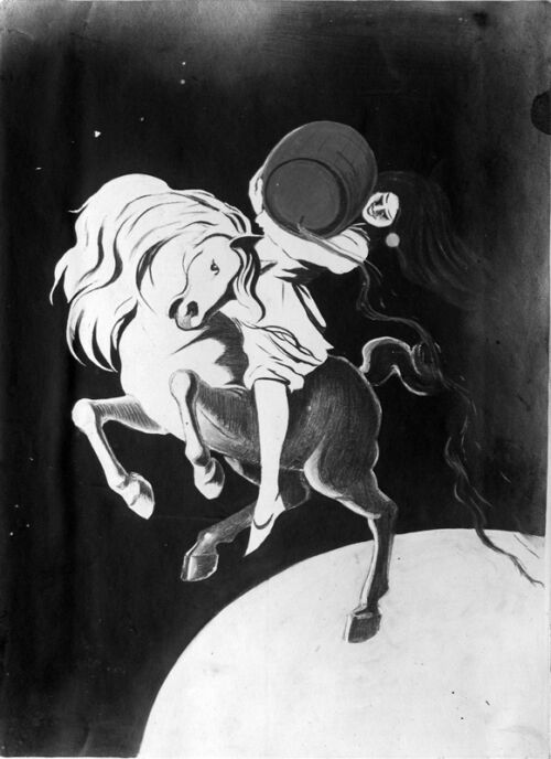 1906 - Une femme vêtue de vert