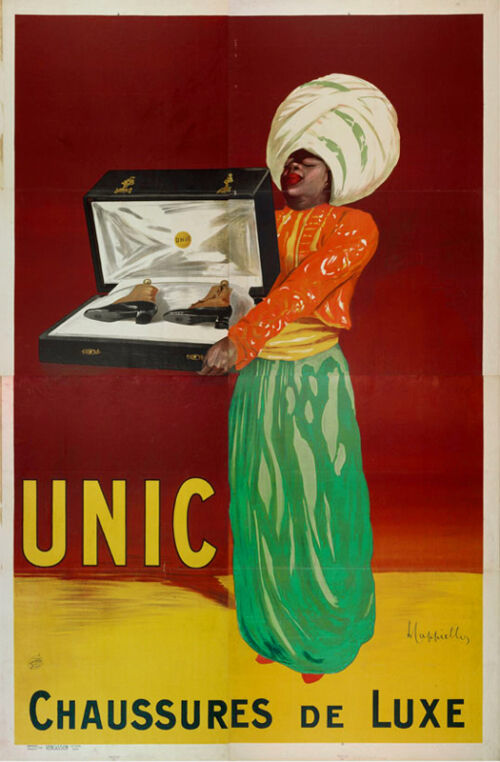 1922 - Un africain vêtu d'un sarouel vert vif et d'un gilet rouge