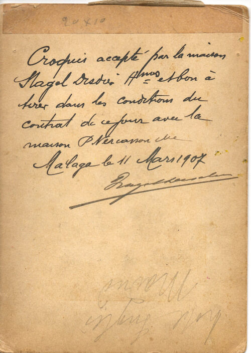 1907 - Une femme assise près d'une table